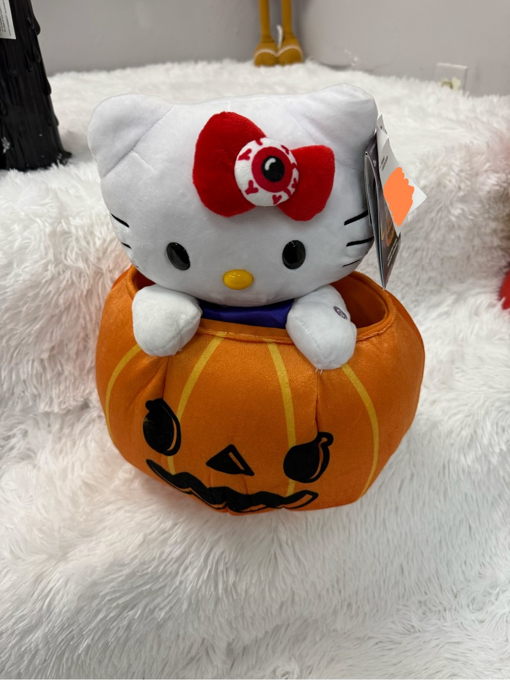 Hello Kitty White animated Plush with Red Eyeball Bow in Orange Pumpkin Bucket